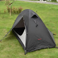 Single person dome tent with aluminum poles in a choice of red, black, or orange colours, shown pitched.
