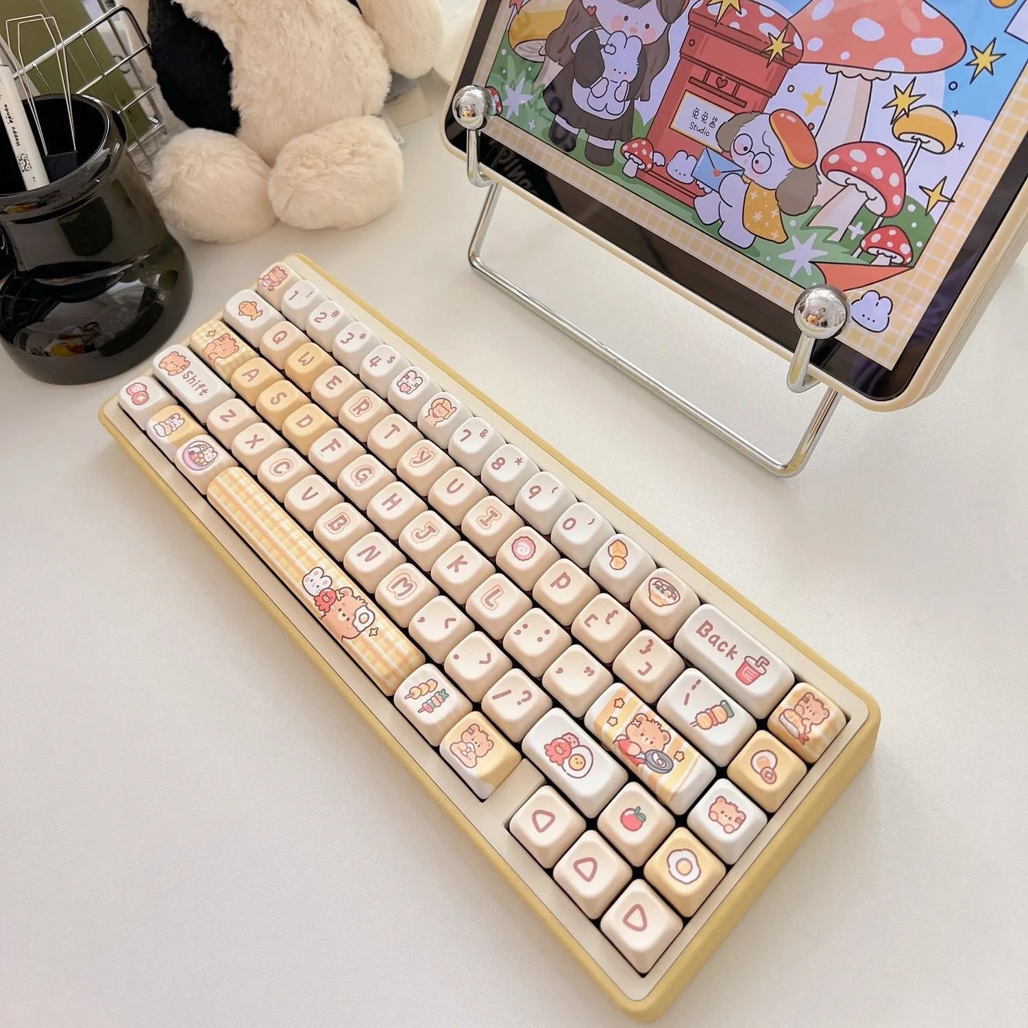 Rabbit Bear Restaurant themed mechanical keyboard keycap set showing 140 PBT plastic keycaps with colourful designs.