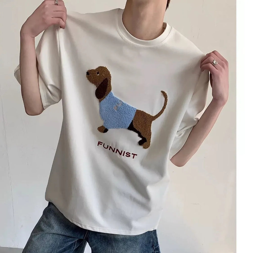Men's grey cotton t-shirt with embroidered sausage dog and towel design showing round neck and short sleeves