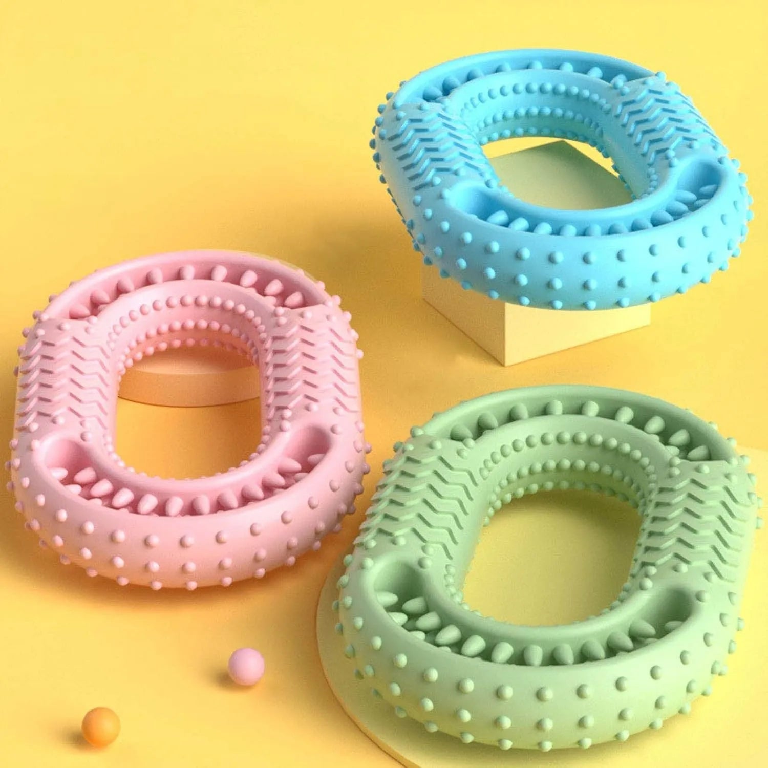 Blue o-ring shaped dog chewing toy for aggressive chewers and dental plaque reduction