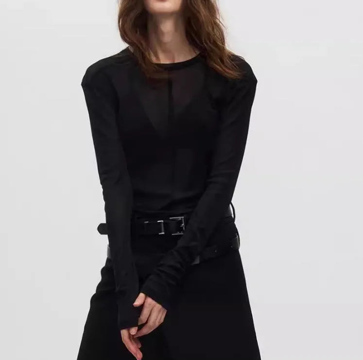 Black slim-fit long sleeve PU mesh pullover top with a see-through texture on a model.