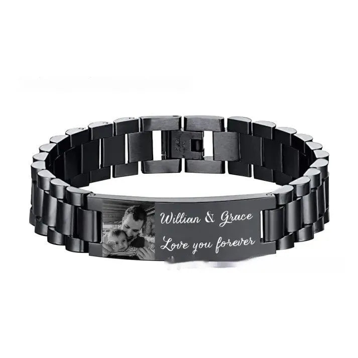 Men's stainless steel bracelet with curved heart piece featuring black electroplated lettering