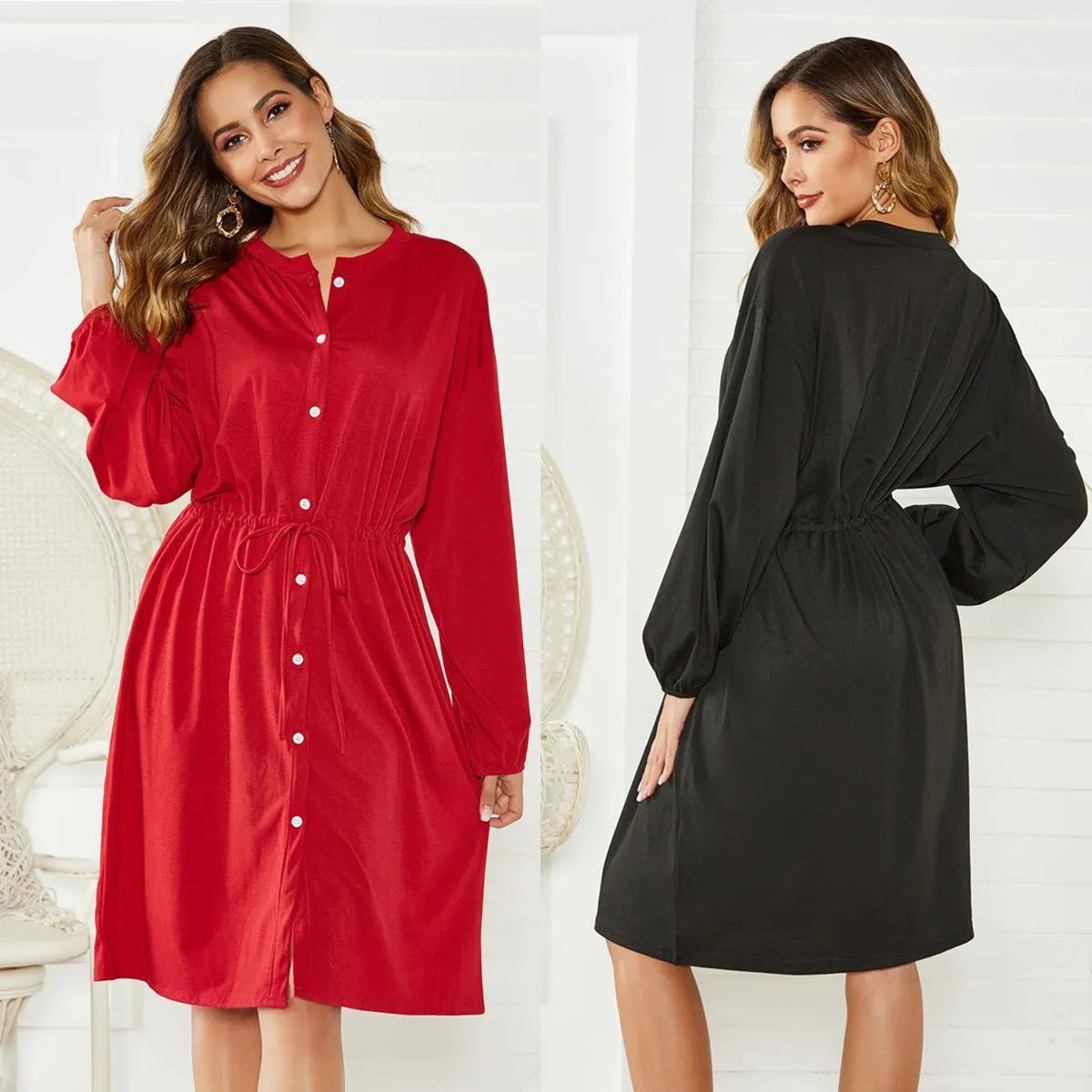 Women's black A-line midi dress with long sleeves, elastic cuffs, and a cinched belt.