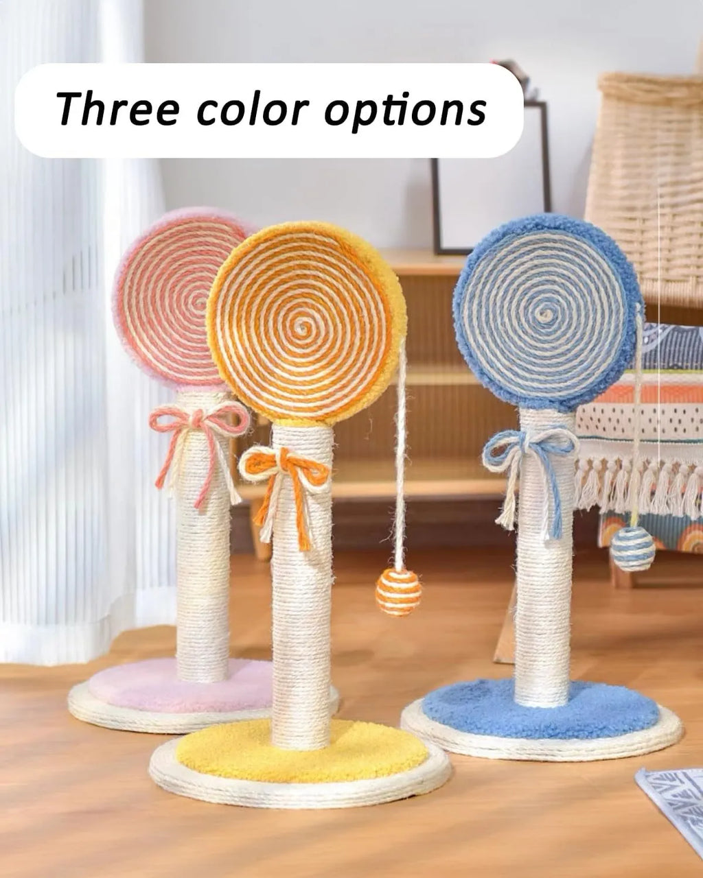 Blue cat scratching post with natural sisal rope and a hanging ball toy on a sturdy square base.
