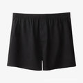 Men's black cotton loose boxer shorts with a high waist on a white background