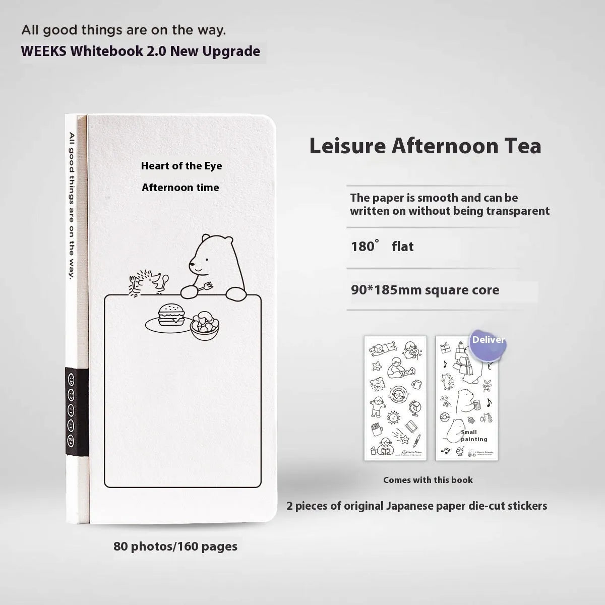 Small white plaid grid notebook with paper cover and decorative stickers