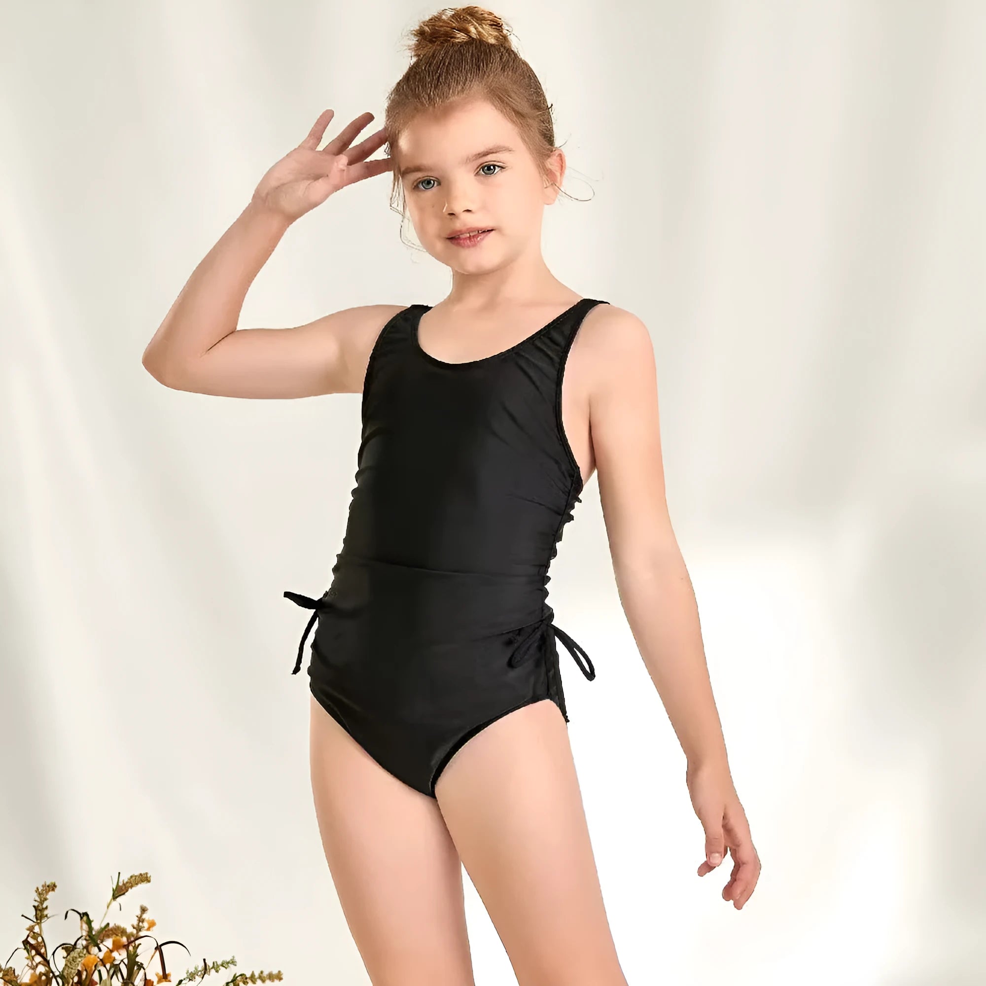 Children's solid black pleated tie swimsuit briefs in polyester spandex for swimming and wading