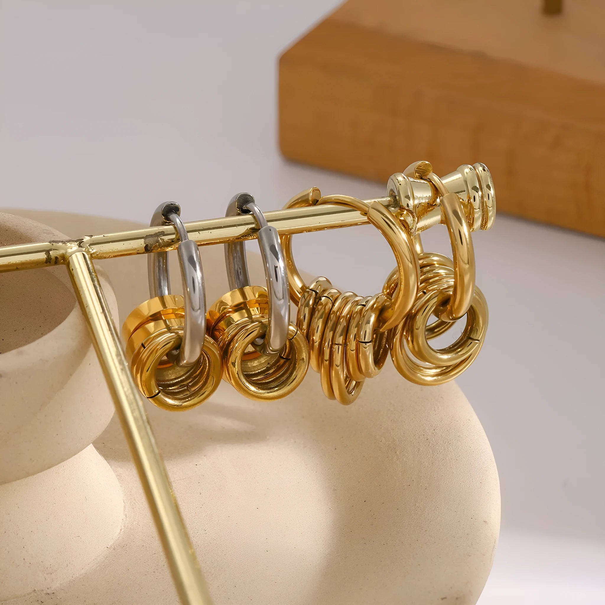 Ins style stainless steel colour matching earrings with electroplated finish showing unisex design