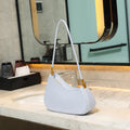 Women's oval shaped PU commuter handbag in multiple colours with internal zip compartment