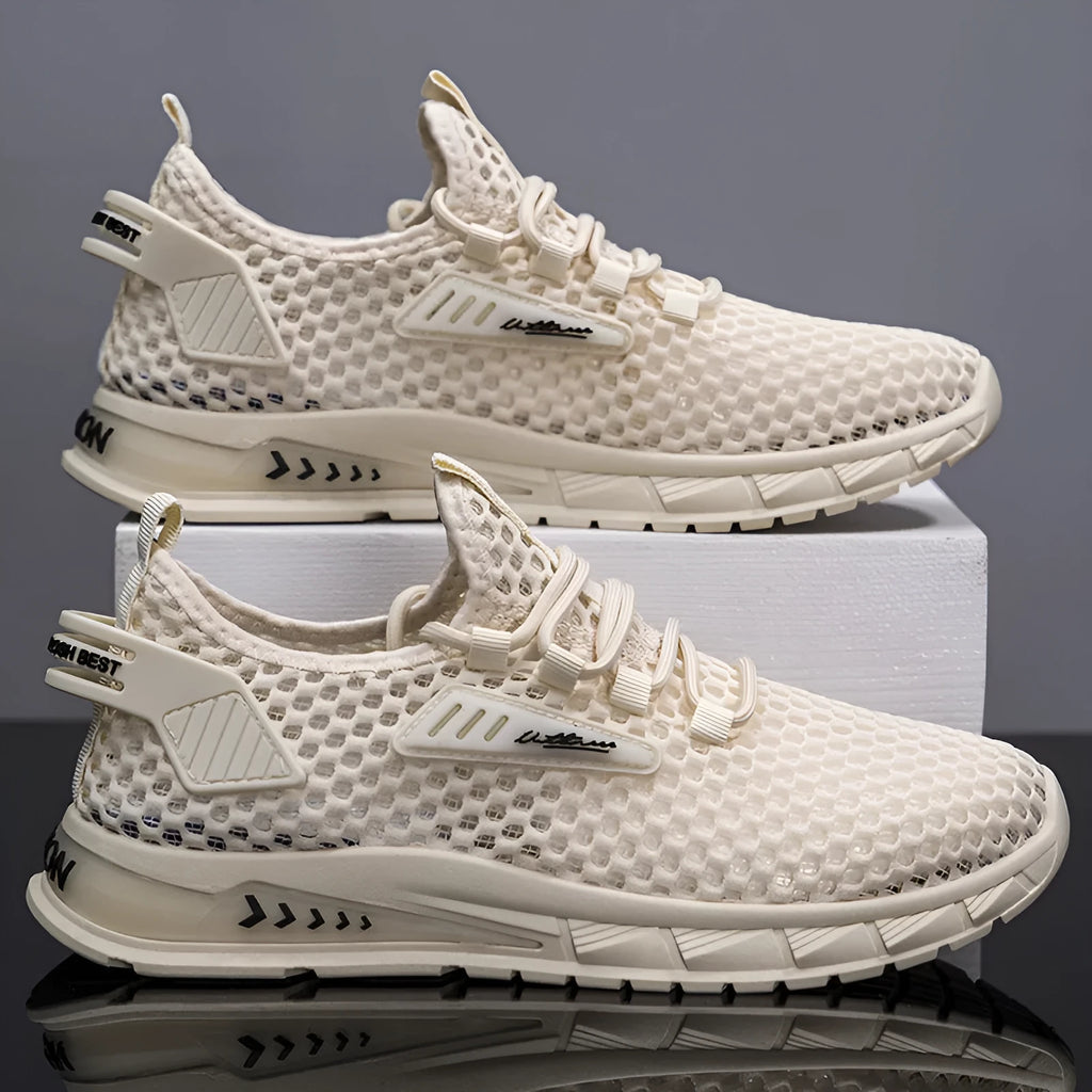 Men's beige casual sneaker with synthetic leather upper and lace-up front on a light background