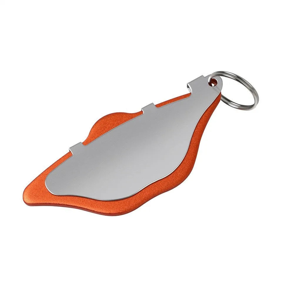 Mountain bike disc brake pads in black and orange colours with adjustment flap