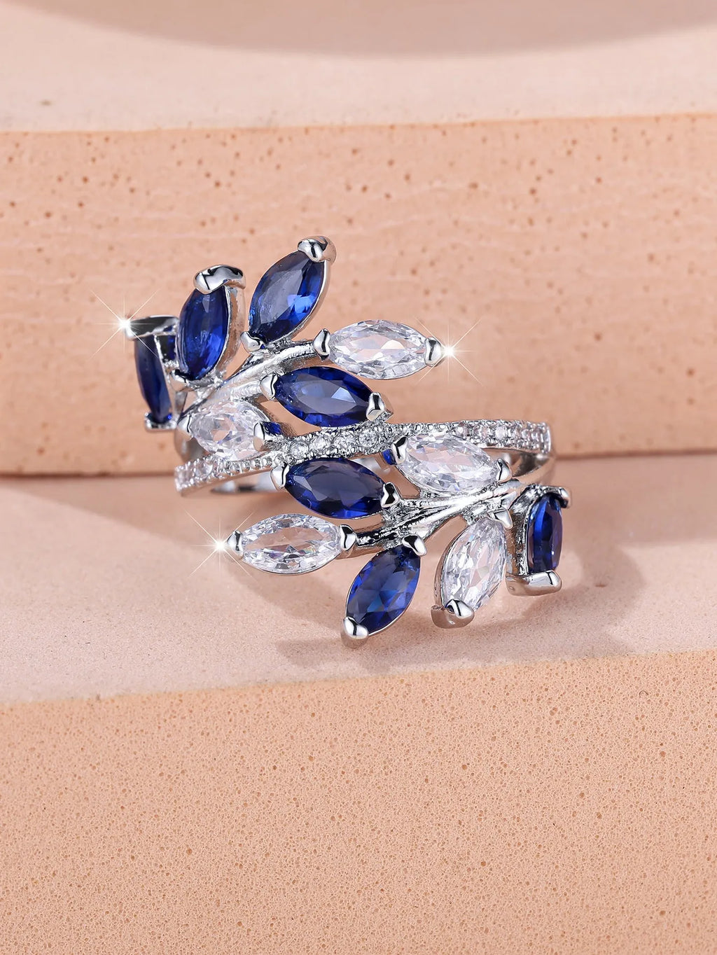 Adjustable copper leaf ring with a central horse eye zircon stone in a choice of nine colour finishes.