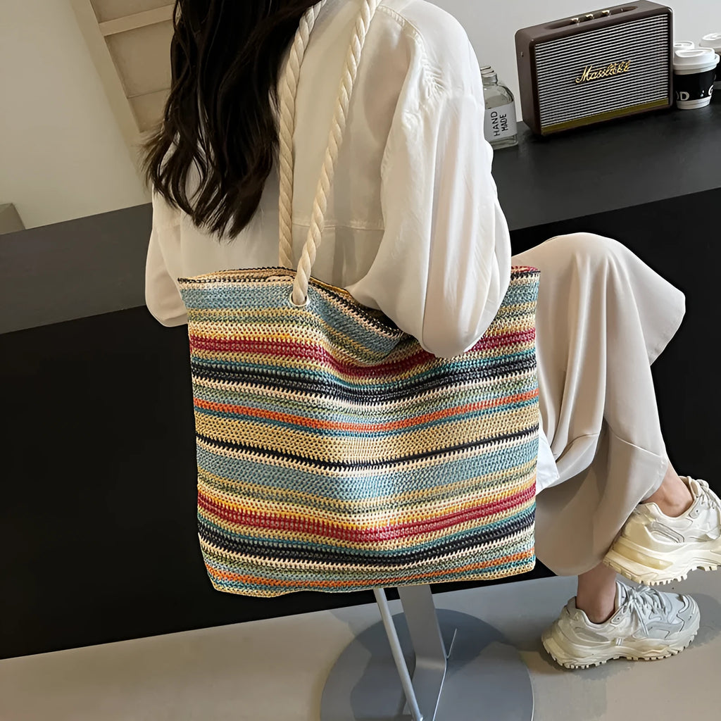 Blue straw woven large shoulder bag with an adjustable nylon strap