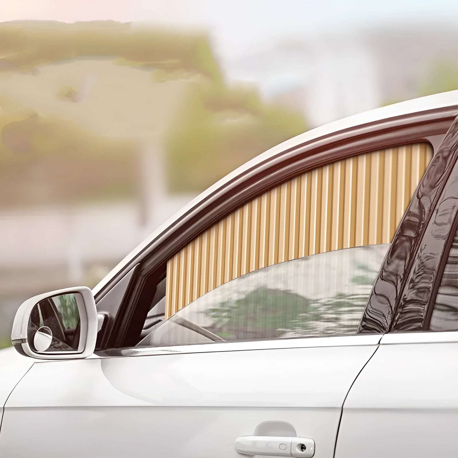 Thick opaque auto retractable car sunshade curtain in black on a car window