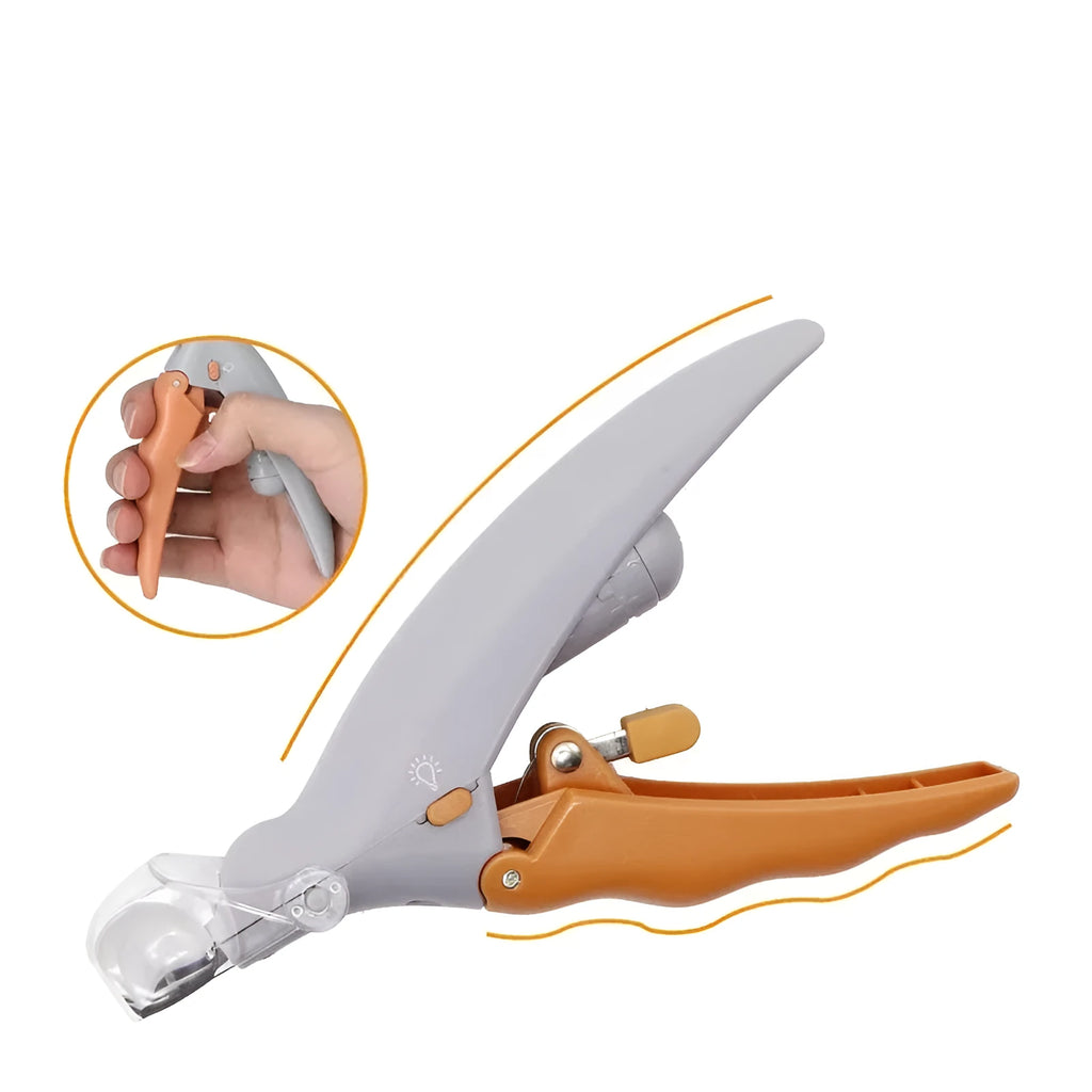 Yellow pet nail clipper with LED light on and magnifying lens visible, showing ergonomic handle design.
