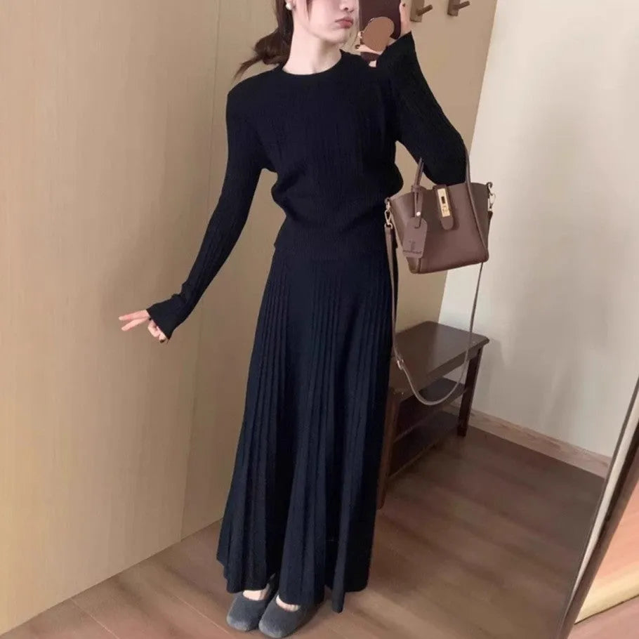 Women's dark grey knitted long dress suit set with 3D pattern, featuring a sweater and skirt in artistic retro style.