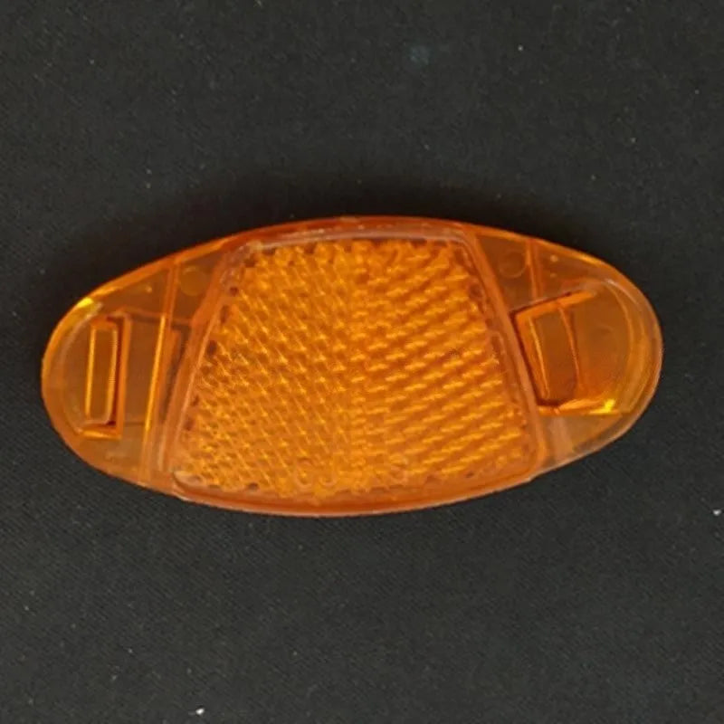Set of four plastic bicycle spoke reflectors in yellow and white colours showing measurements