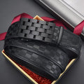 Men's genuine leather automatic buckle belt in carved plaid design on white background