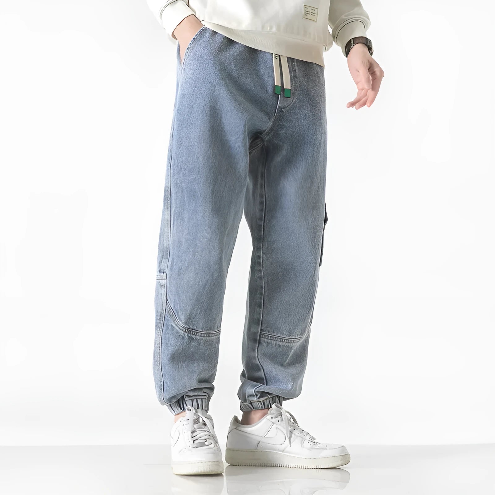 Men's loose-fit tapered cotton trousers in black, available in sizes from M to 8XL