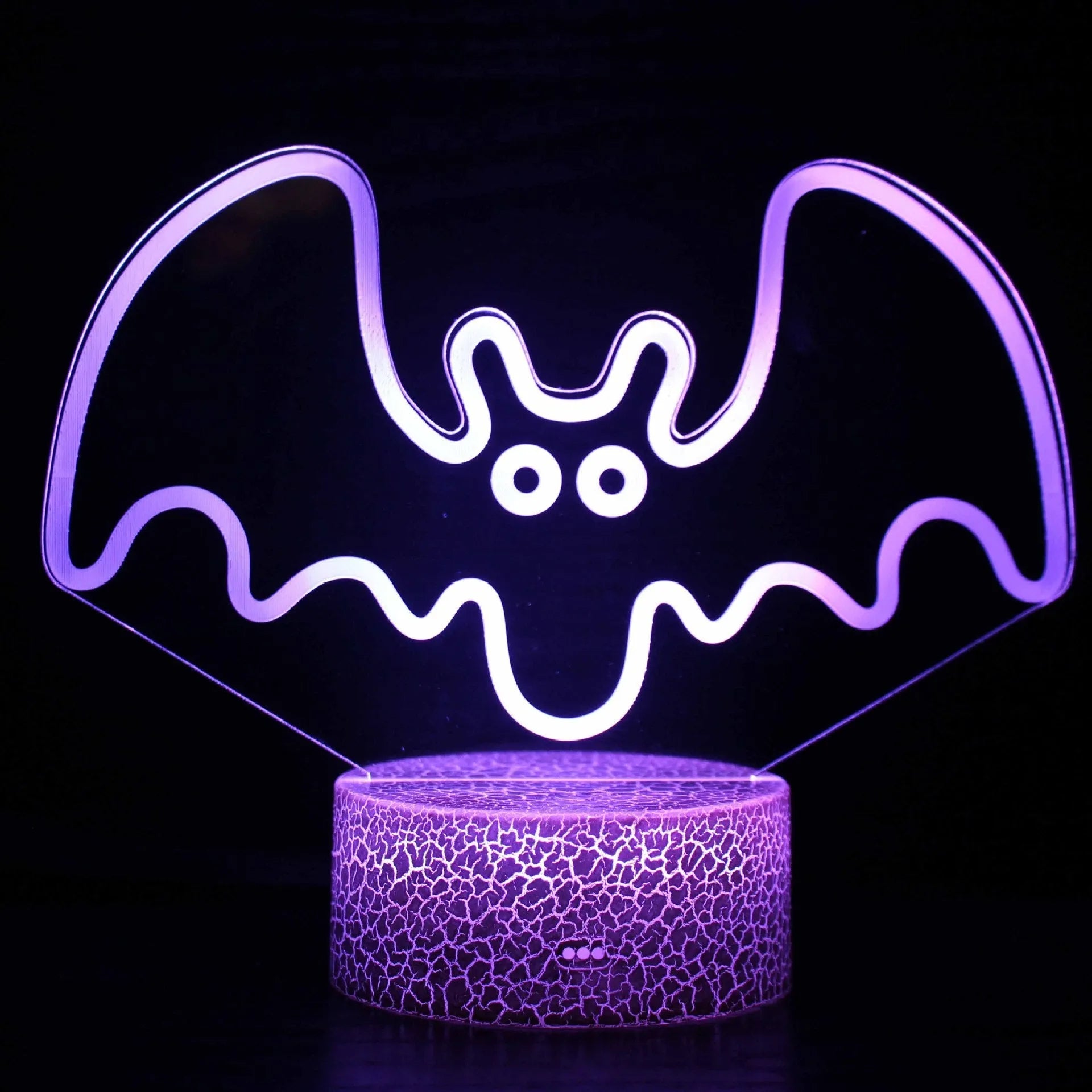 Acrylic 3D colourful touch USB table lamp with crack base design and LED light on a desk.