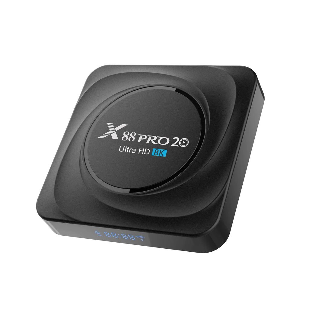 Compact black Android 11 TV box with remote control and HDMI cable on a table