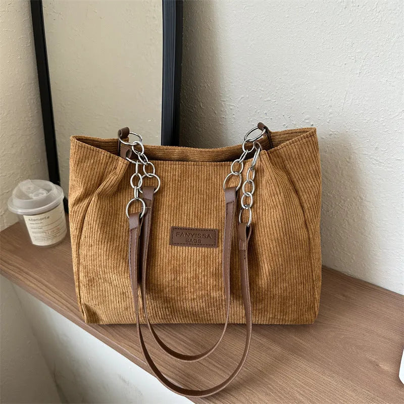 Corduroy tote bag with three-dimensional pockets in black colour option