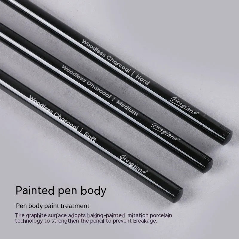 Solid graphite and carbonised artist pencil set with wooden shells for drawing and sketching