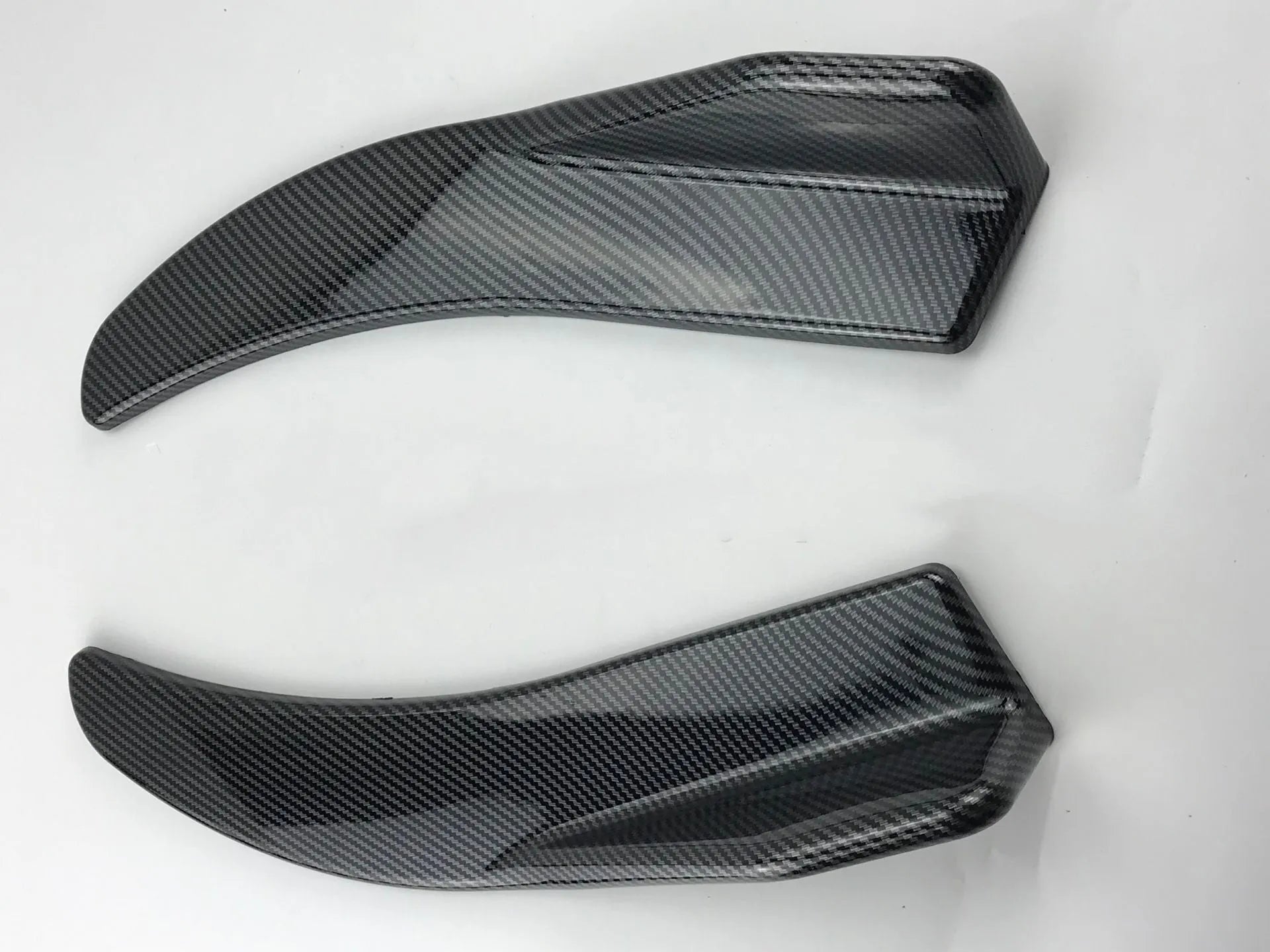 Car front and rear deflector light trim in carbon fibre finish for General Motors vehicles