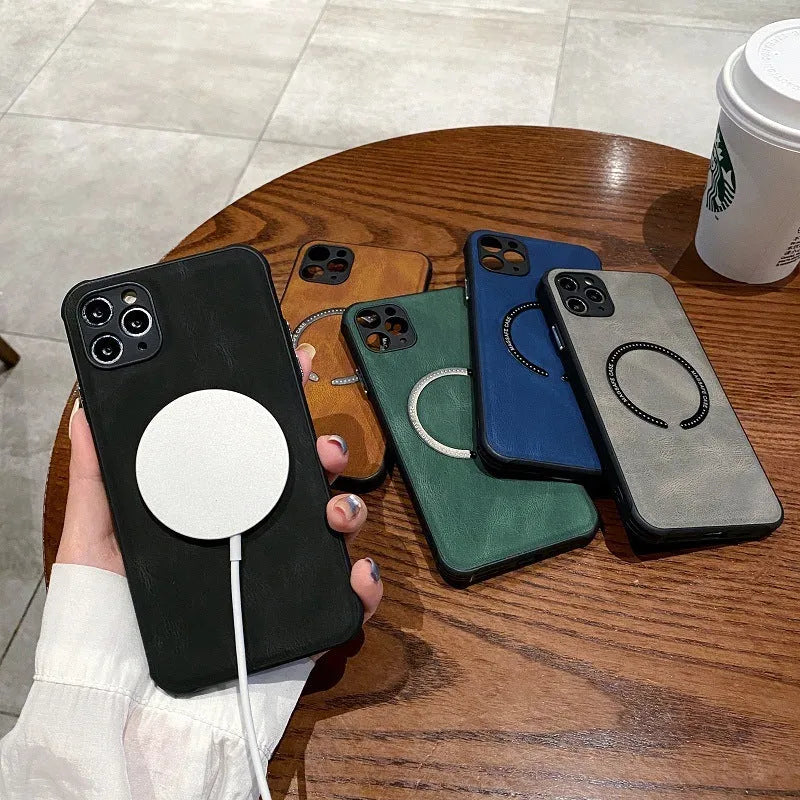 Black imitation leather magnetic charging case for iPhone on a table.