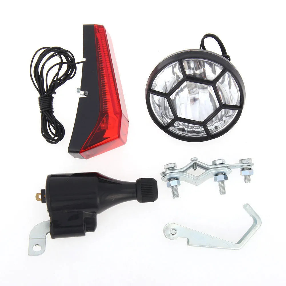 Silver bicycle dynamo generator light set with friction drive mechanism for front and rear lighting