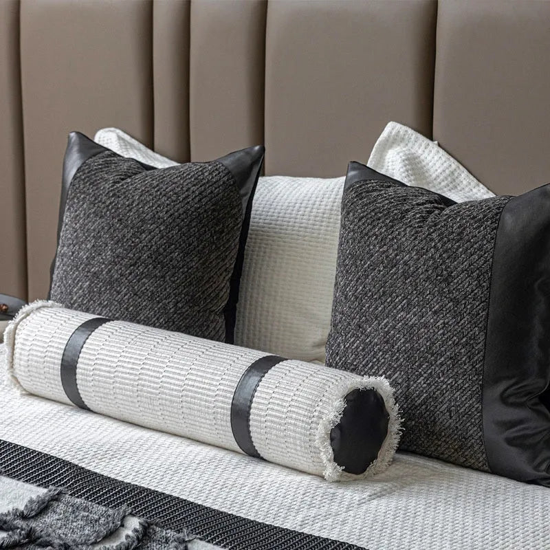 Modern minimalist grey and white plaid bed runner blanket set with leather round pillow on a 1.5m bed.