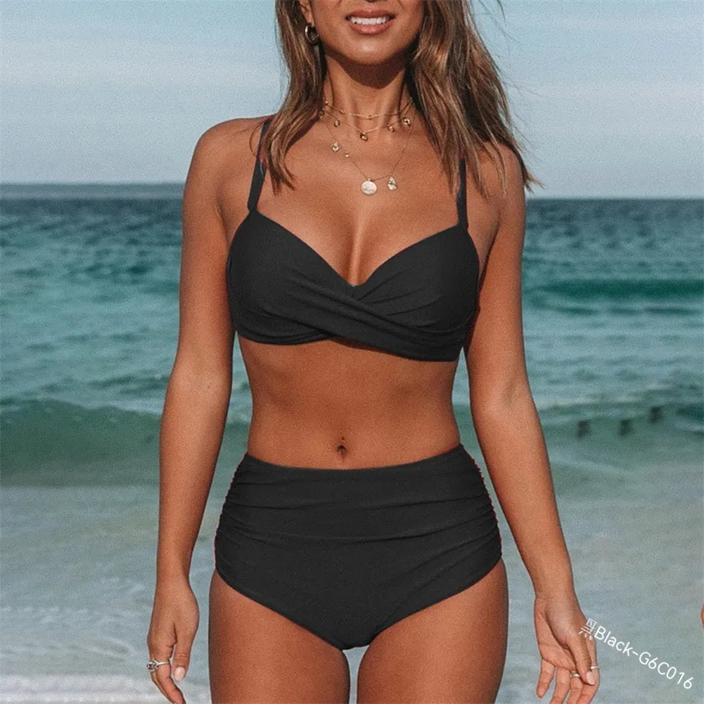 Women's cross-strap bikini swimsuit in solid colour on a mannequin, showing front and back views.