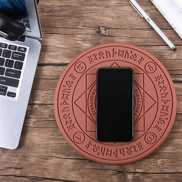 Square wireless phone charger with magic array pattern design glowing blue during charging