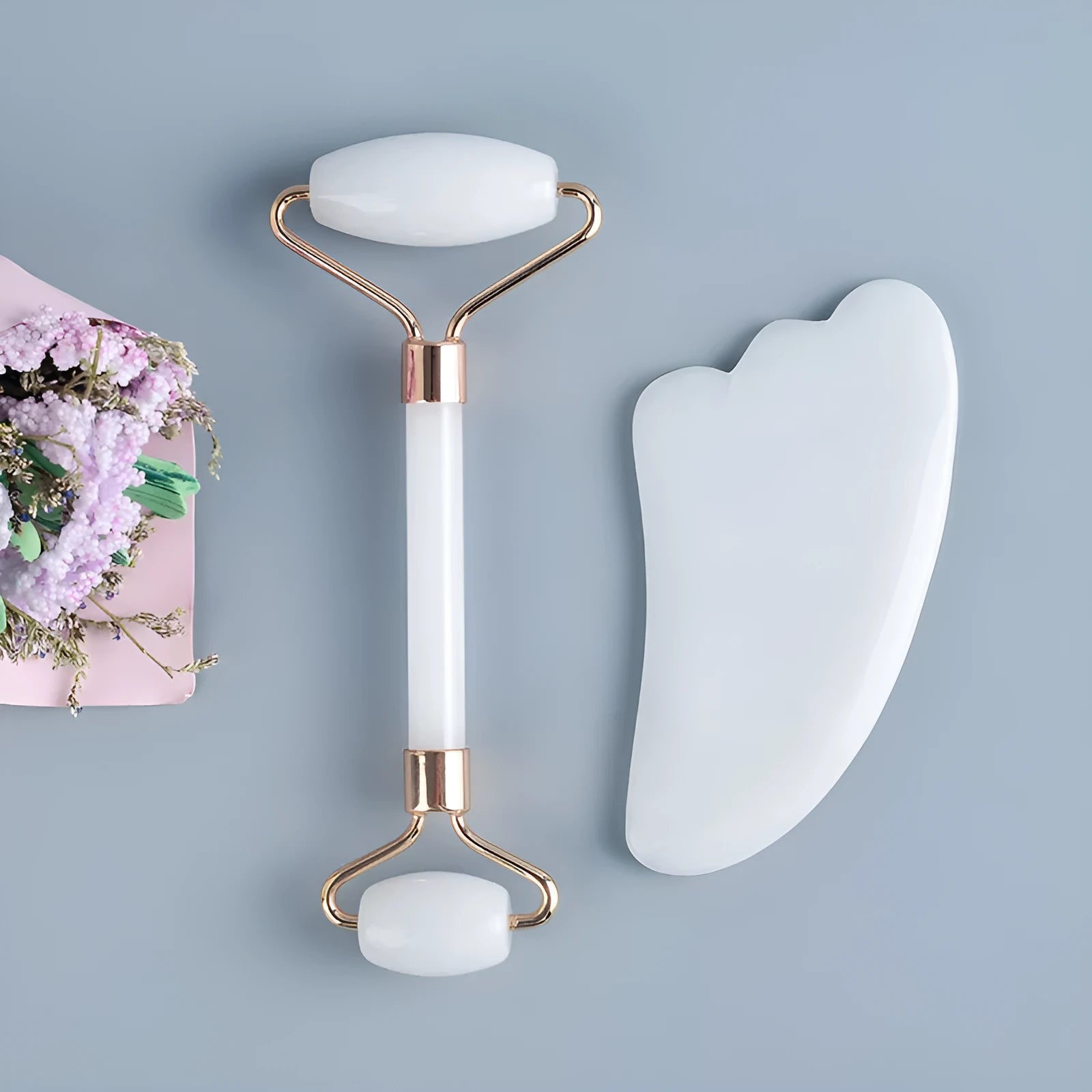 White jade roller and claw massage set with storage board for facial and body treatment