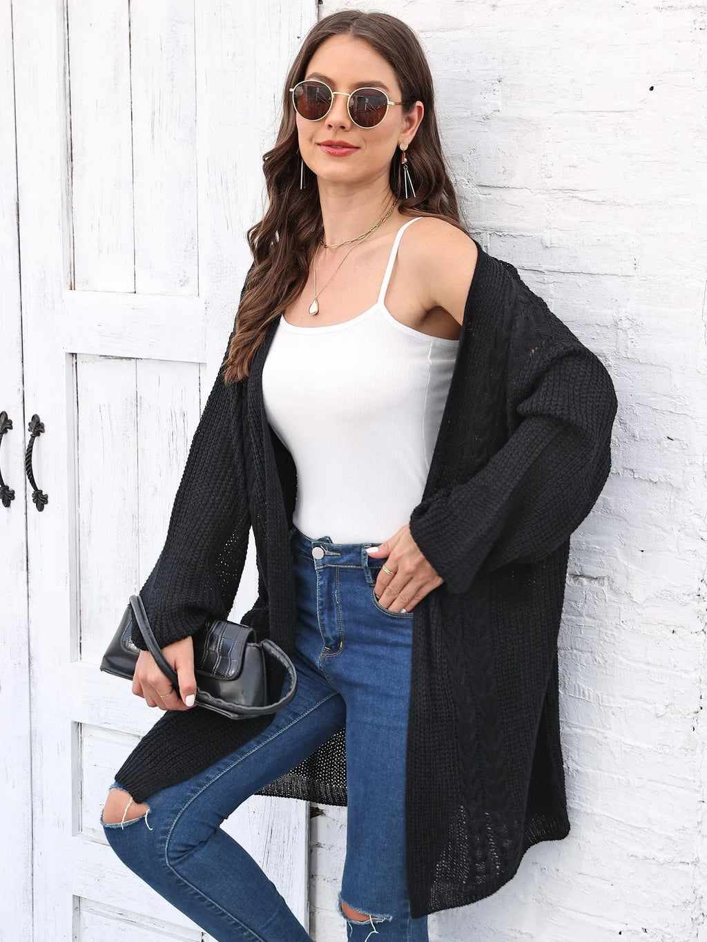 Women's loose fit acrylic sweater coat cardigan in a solid colour, shown in free size.