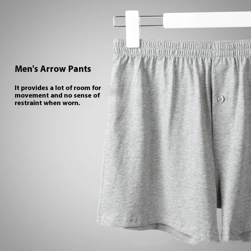Men's black cotton loose boxer shorts with a high waist on a white background