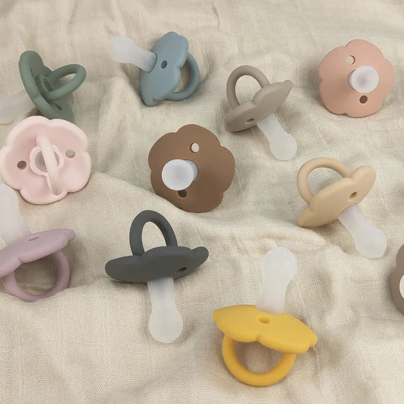 Baby pacifier in edible silicone with lace nipple in apricot colour for 0-6 months