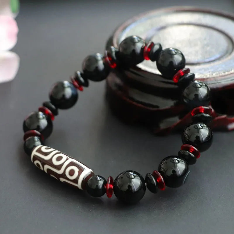Hand-woven black agate dzi bead bracelet with 11mm geometry beads