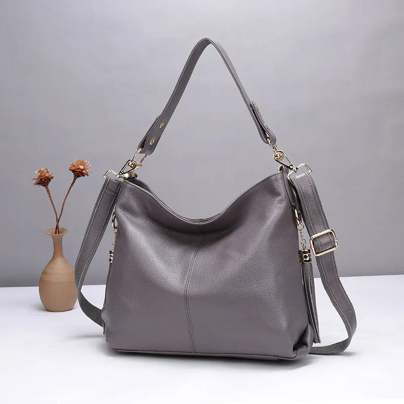 Genuine leather women's crossbody bag in vertical square shape with multiple zipper compartments