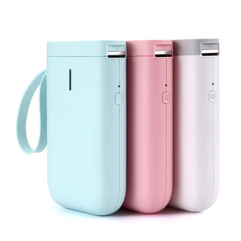 D11 Bluetooth thermal label printer in chosen colour next to smartphone showing label design app.