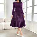 Purple women's long sleeve dress with ruffles and mid waist design on hanger