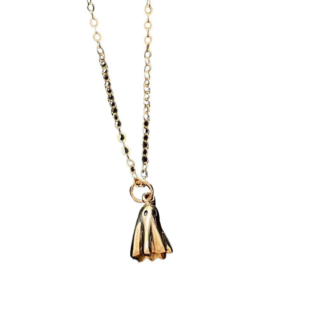 A ghost-themed pendant necklace on a twisted stainless steel chain, showing the titanium steel pendant detail.