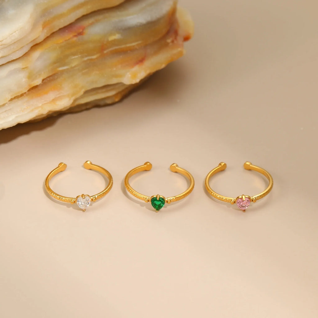 Open-ended stainless steel ring with geometric heart shape and inlaid zircon stones