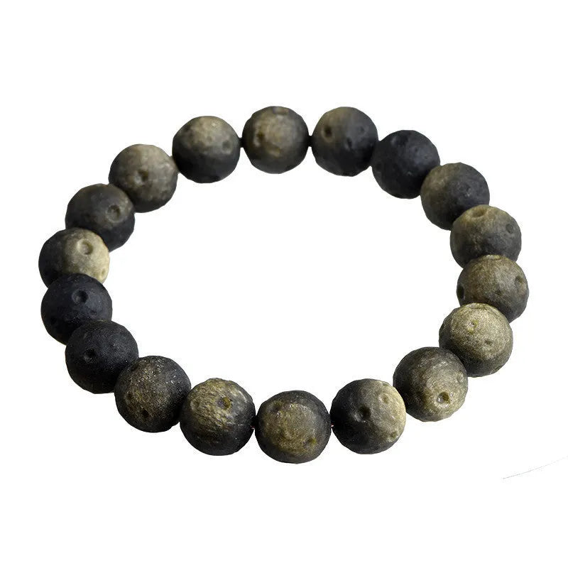 Obsidian crater ball bracelet with grinding texture in silver or golden meteorite colours