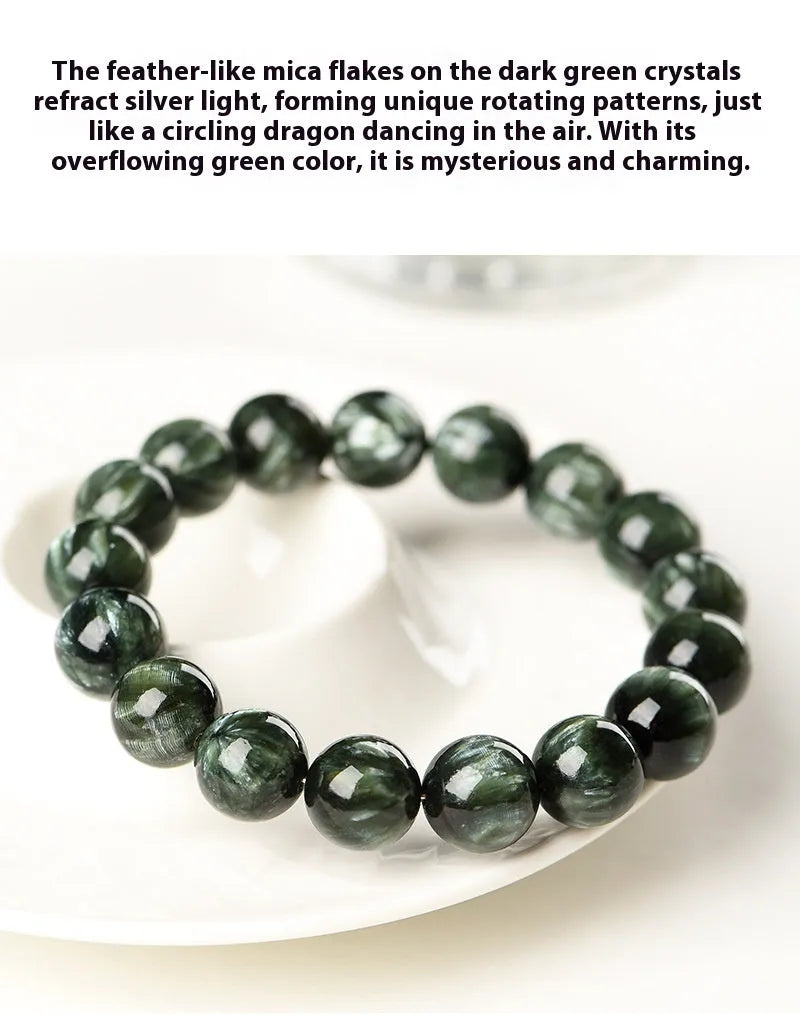 Green Dragon Crystal bracelet with Ruyi design and 8-9mm round beads on a wrist.