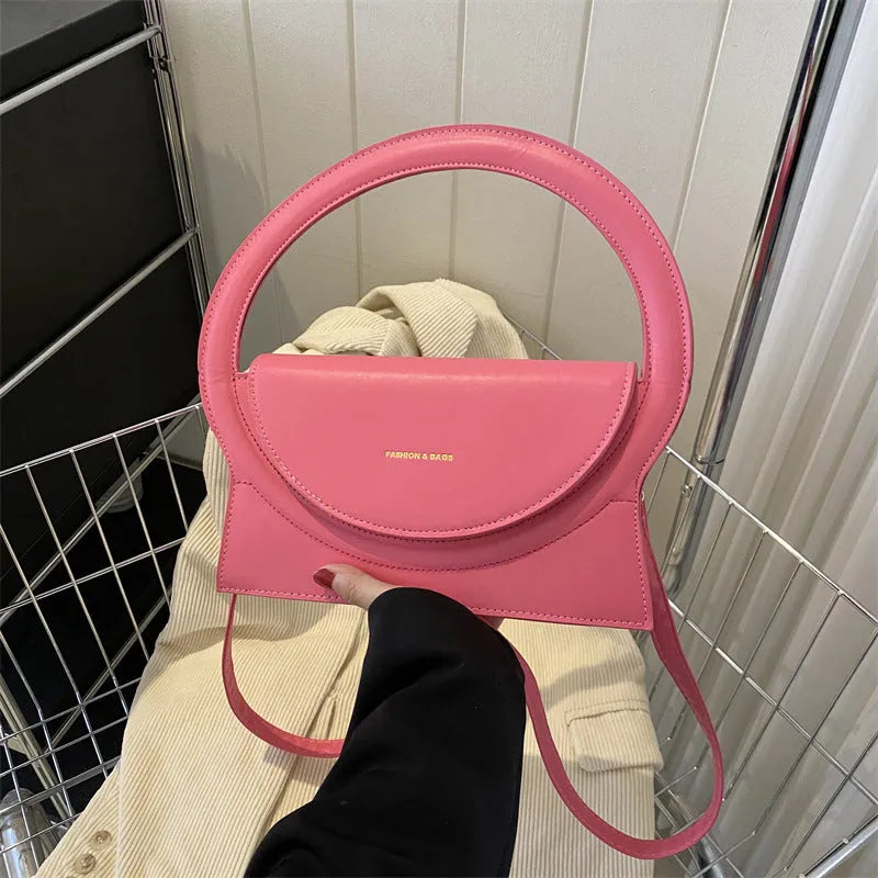 Horizontal square messenger bag in PU leather with sandwich pocket and stitching details