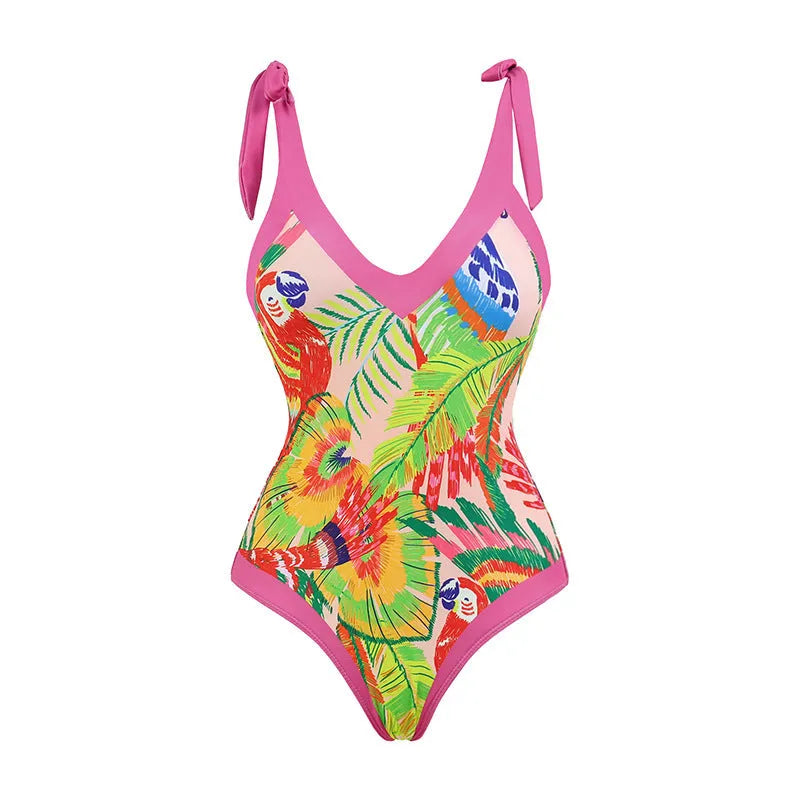 Pink floral print one-piece swimsuit with V-neck, covered belly design, and attached thin skirt