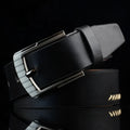 Men's retro-style imitation leather belt with pattern and alloy pin buckle, shown in black.