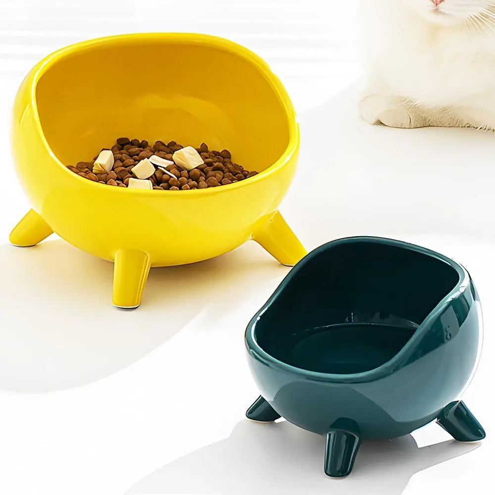 Ceramic pet bowl with four legs, wide mouth, and rounded arc design in green colour