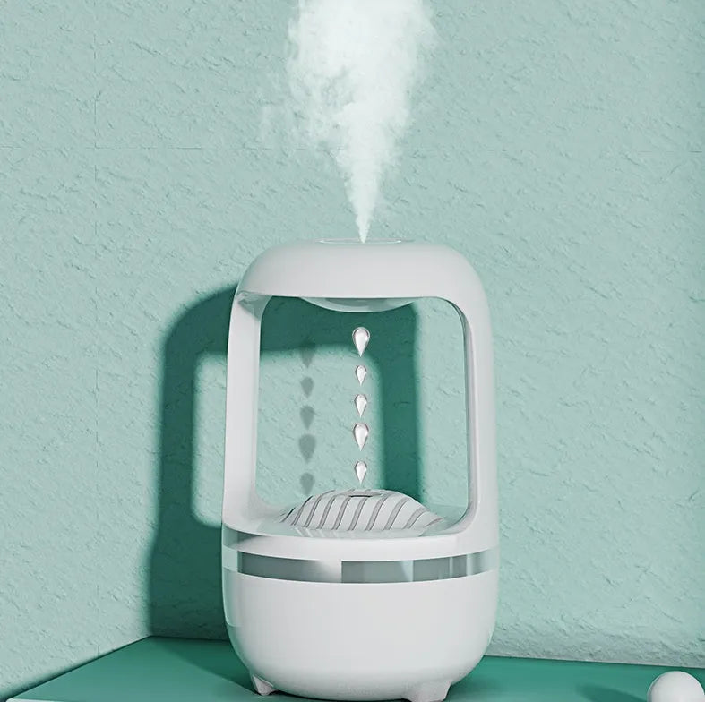 Black or white anti-gravity humidifier showing water droplet effect, with USB cable and 500ml water tank.
